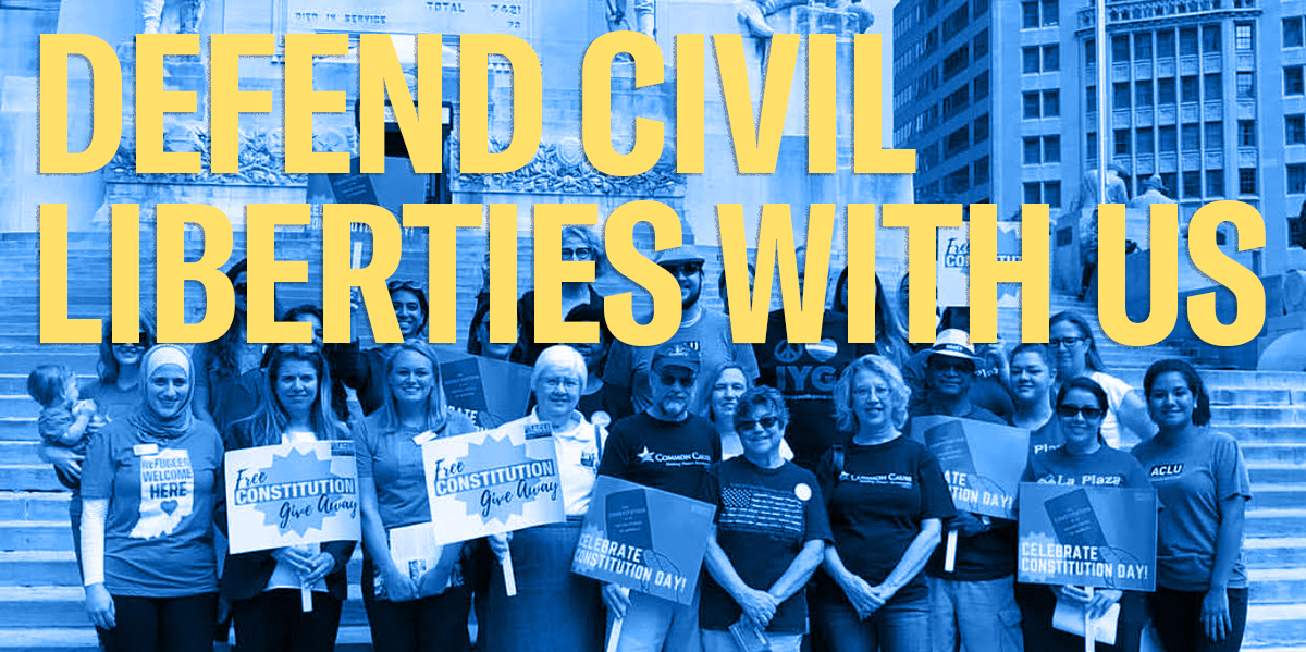 a group of ACLU of Indiana volunteers with constitution day signs and header that read