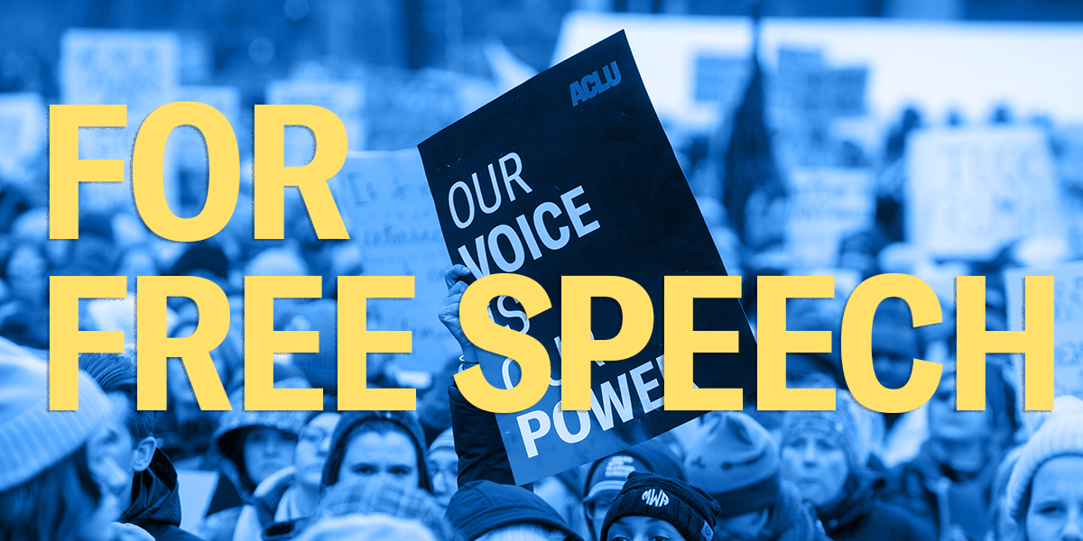 ACLU Protesters holding signs that read