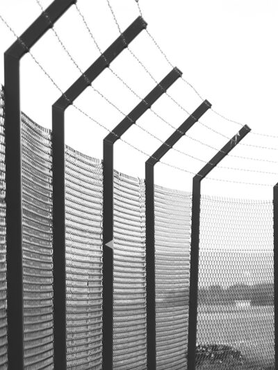 jail fence with barbed wire