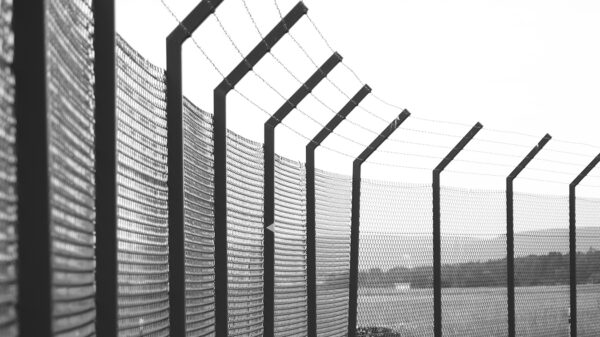 jail fence with barbed wire