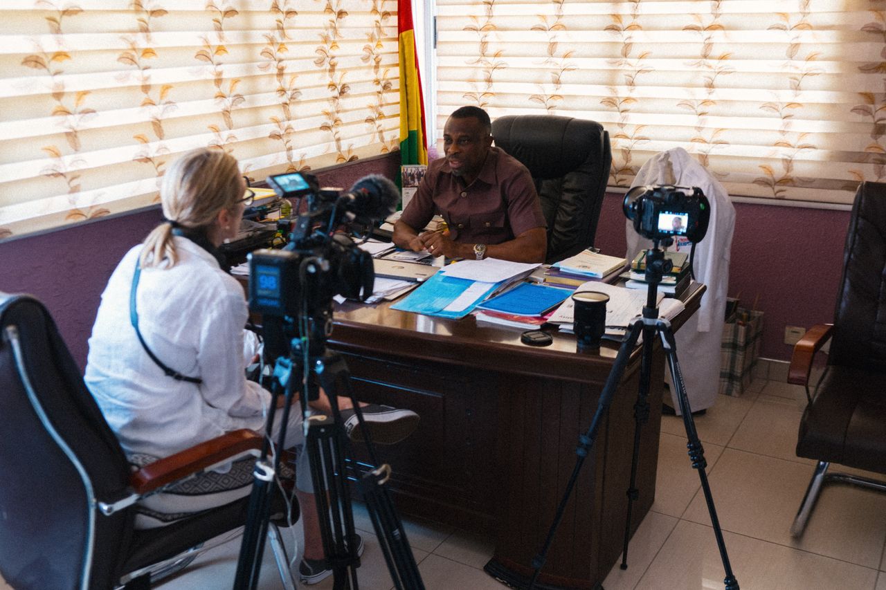 Carolyn interviewing Dr. Emmanuel Obeng, CEO of Trinity Hospital