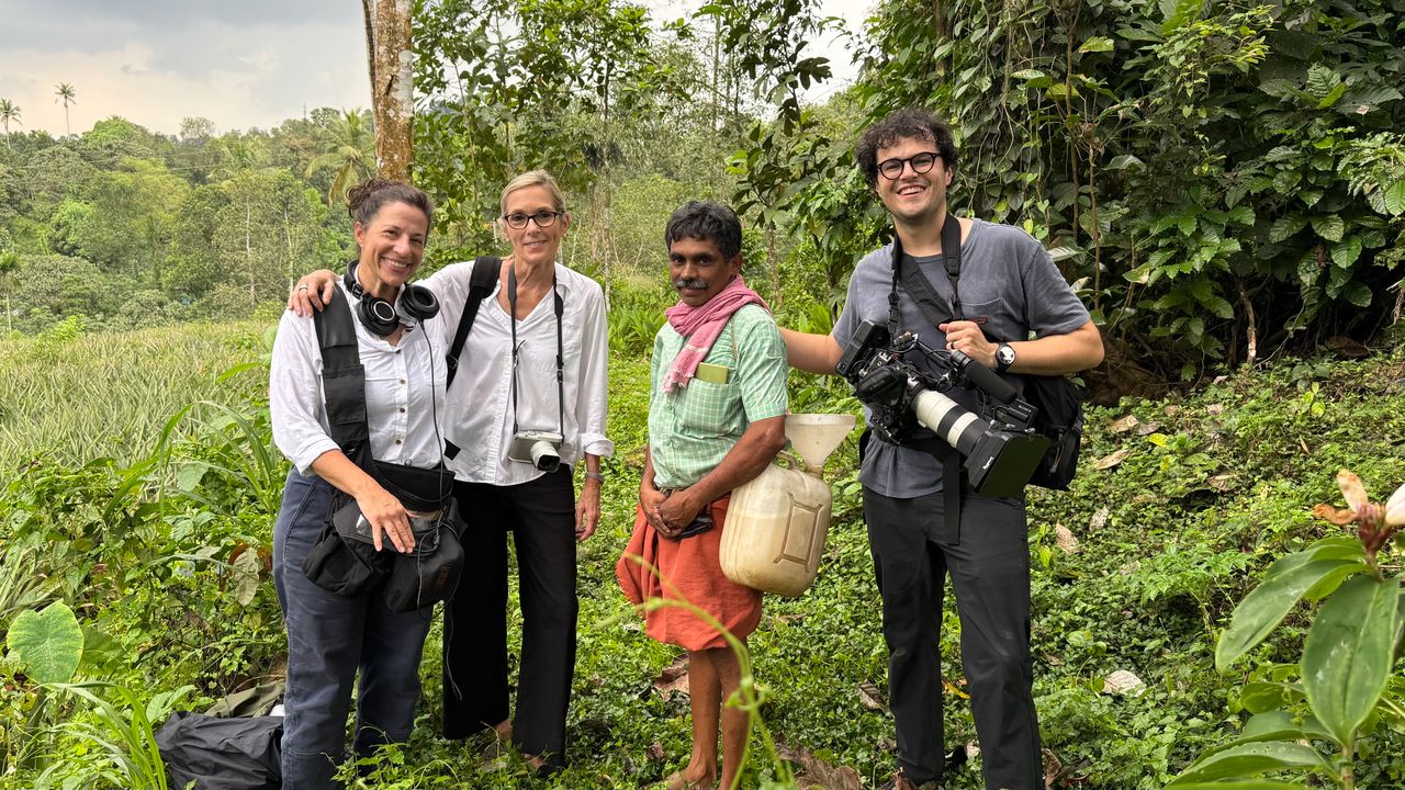 Lisa, Carolyn, and Rob with Tody Tapper in Kerala, India.