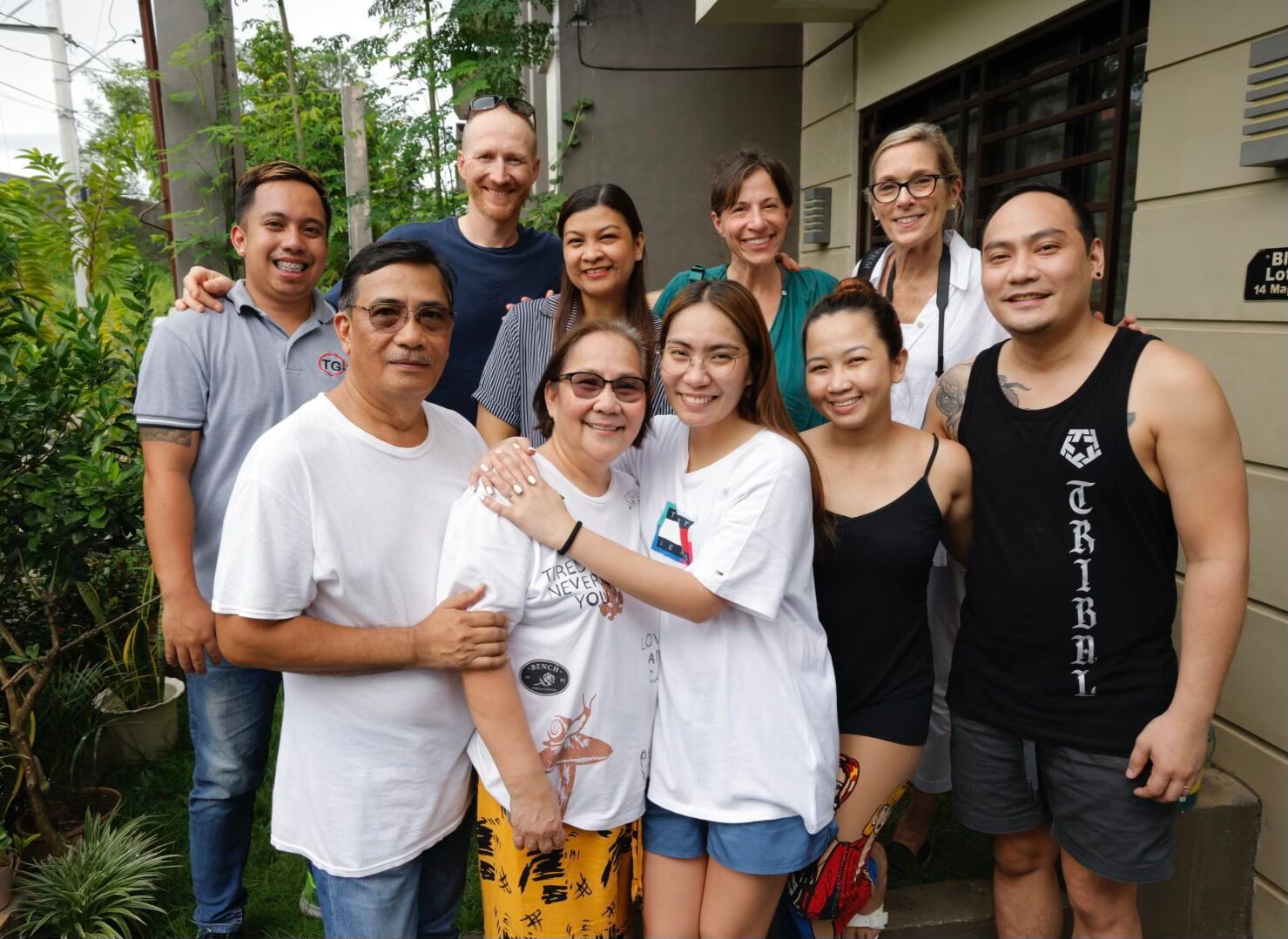 Film crew with local producers and Isabel and her family.