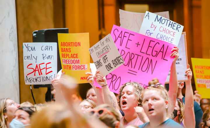 Protestors inside the Indiana Statehouse supporting abortion access